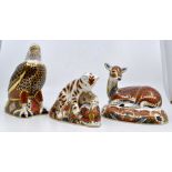Three Royal Crown Derby paperweights to include a deer, eagle and a tiger cub, gold stoppers CR;