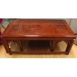 A contemporary mahogany nest of three tables, of recent manufacture, in the Chinese manner,