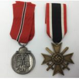 Reproduction Third Reich Eastern Front Medal and a Reproduction Third Reich War Merit Cross 2nd