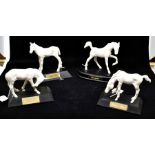 A Beswick collection of horse figures, in white matt, comprising Spirit of Earth, Spirit of