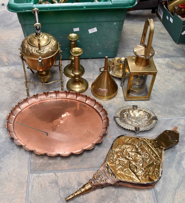 A collection of brassware, including watering can, candlesticks, spirit kettle and others. To