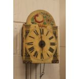 A George III wooden wall hanging clock, 30 hour movement, having a painted wooden dial, black