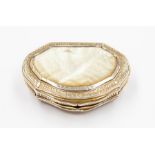 A French silver and gilt mounted mother-of-pearl cartouche shape snuff box, the silver mounts