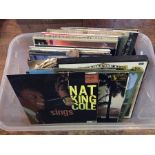 A collection of records including opera examples and Nat King Cole