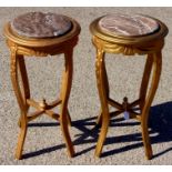 A pair of giltwood marble topped jardiniere stands, having red marble tops, of circular form, 67cm