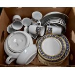 Three boxes of assorted tea sets, including Wedgwood Ice Rose, Fiesta collection, and an iron red