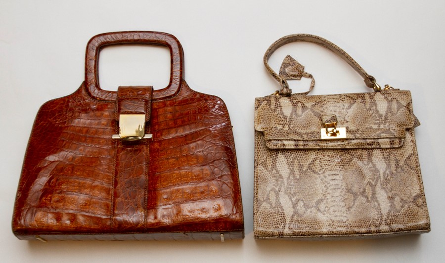 A Italian tan late 1950s crocodile bag in a square design with a croc handle and metal clasp