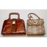 A Italian tan late 1950s crocodile bag in a square design with a croc handle and metal clasp
