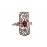A ruby and diamond 18ct yellow gold and platinum ring, Art Deco styling, comprising  an oval ruby,