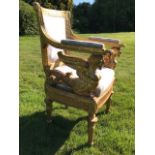 An Empire design giltwood ceremonial fauteuil, in the manner of Jacob-Desmalter, with rectangular