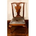 A George I period walnut side chair, circa 1720, pierced urn splat back united with scrolled