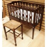 A Victorian style mahogany openwork framed child's cot, sprung mattress support, with brass canopy