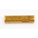 A Dunhill gold plated Cigarette Lighter pattern no: 3910750