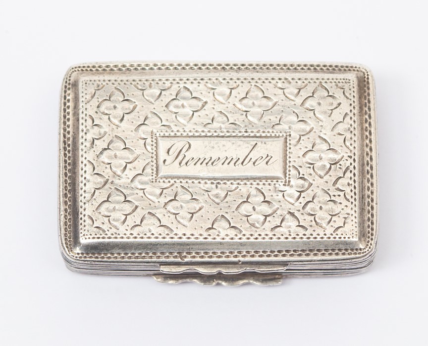 A George III silver vinaigrette, rectangular form, floral engraved decoration with engraved