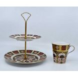 A collection of Royal Crown Derby pattern 1128 to include plates, cake stand, cups, 18 pieces, all