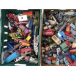 Die cast: large quantity of vintage playworn die cast vehicles in two boxes.