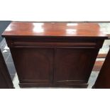 A mid Victorian mahogany chiffonier, shaped frieze drawer to top, two panelled cupboard doors below,