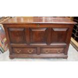 A George II joined oak mule chest, circa 1740, plank top, having a three panelled front with