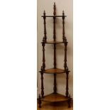 A mid Victorian walnut and marquetry bow fronted corner what-not, with four tiers, each tier