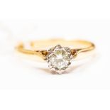 A diamond and 18ct gold solitaire ring, the illusion set brilliant cut diamond measuring approx. 0.