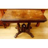 A Victorian burr oak fold-over card table, the top folding over and swivelling round, raised on