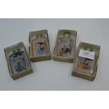 A boxed set of four Oriental painted snuff bottles (4)