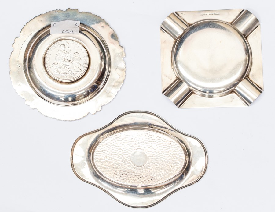 A group of three ashtrays to include a silver Boodle & Dunthorpe ashtray, Birmingham 1954 square - Image 2 of 2
