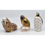 Three Royal Crown Derby paperweights, comprising Kingfisher, Walrus, and a Penguin, all in the Imari