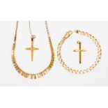 A collection of 9ct gold jewellery to include two 9ct gold crucifixes (including one on a fine chain