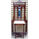 A Victorian mahogany mirror backed hall stand, turned gallery to top, mirror to centre, marble