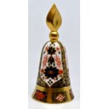 A Royal Crown Derby candle snuffer, first, pattern 1128. Condition: No obvious signs of damage or