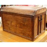 An early 20th Century oak framed travelling trunk, arched shaped, birch veneered panels, fitted with