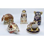 Five Royal Crown Derby paperweights in the form of an armadillo, frog, tortoise, platypus and a