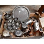 A collection of early 20th Century pewter wares including tea services and tankards, with three