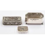 A collection of three various silver boxes to include: George V rectangular box, the cover chased