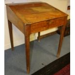 A 19th Century hardwood slope front desk, the sloping front enclosing a fitted interior, raised on