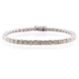 A diamond set 18ct white gold bracelet, the bracelet set with  forty five illusion set brilliant cut