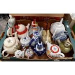 A collection of novelty and traditional china and earthenware teapots to include; seagull, Santa,