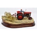 Two Border Fine Arts models of working farm tractors along with Country Fine Arts models. No boxes