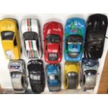 Die cast collection of 1:18 scale cars, unboxed.