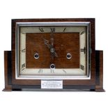 A George V Art Deco oak mantle clock, by J. Smith of Derby, square dial, complete with pendulum