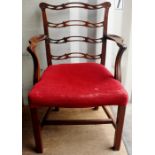 A George III style mahogany open armchair, of ladder-back form, in the manner of Thomas Chippendale,