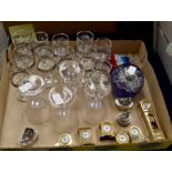 Plated baby tooth pots, miniature clocks and a collection of glass ware including paperweights