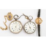 A Victorian yellow metal oval locket with blue enamel star detail, a 9ct gold cased watch and two