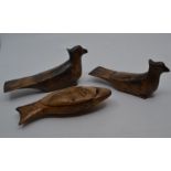 Two carved doves and a fish circa early 20th Century, brought back from the Holy Land