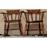 A pair of 19th Century elm seated captains chairs