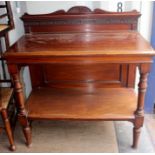 A Victorian mahogany buffet, of two-tier form, each tier raised on turned columns, 118.5cm high,
