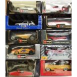 Die cast 1:18 scale vehicles, Burago, Maisto, Revell. Some box wear.