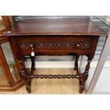 A Jacobean style joined oak side table, made in the traditional manner, fitted with a single drawer,