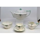 A Shelley 1930's green mark ten piece tea set including teapot, cups, saucers, plates, two cake